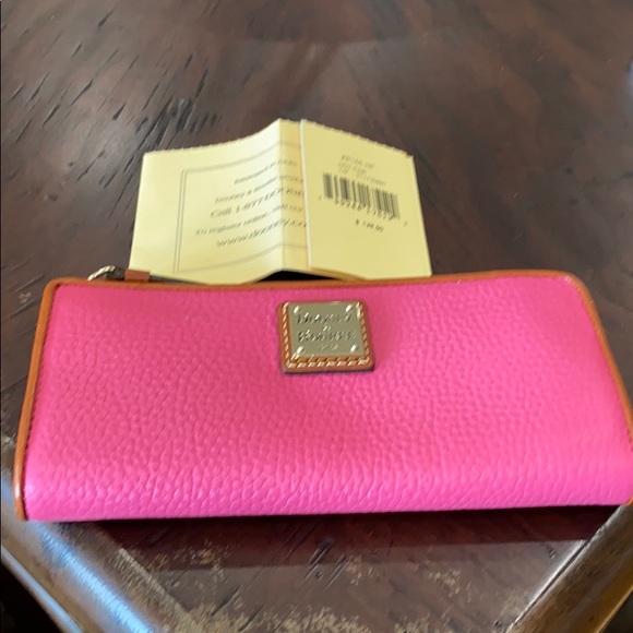 Dooney & Bourke Handbags - Dooney & Bourke pink leather wallet